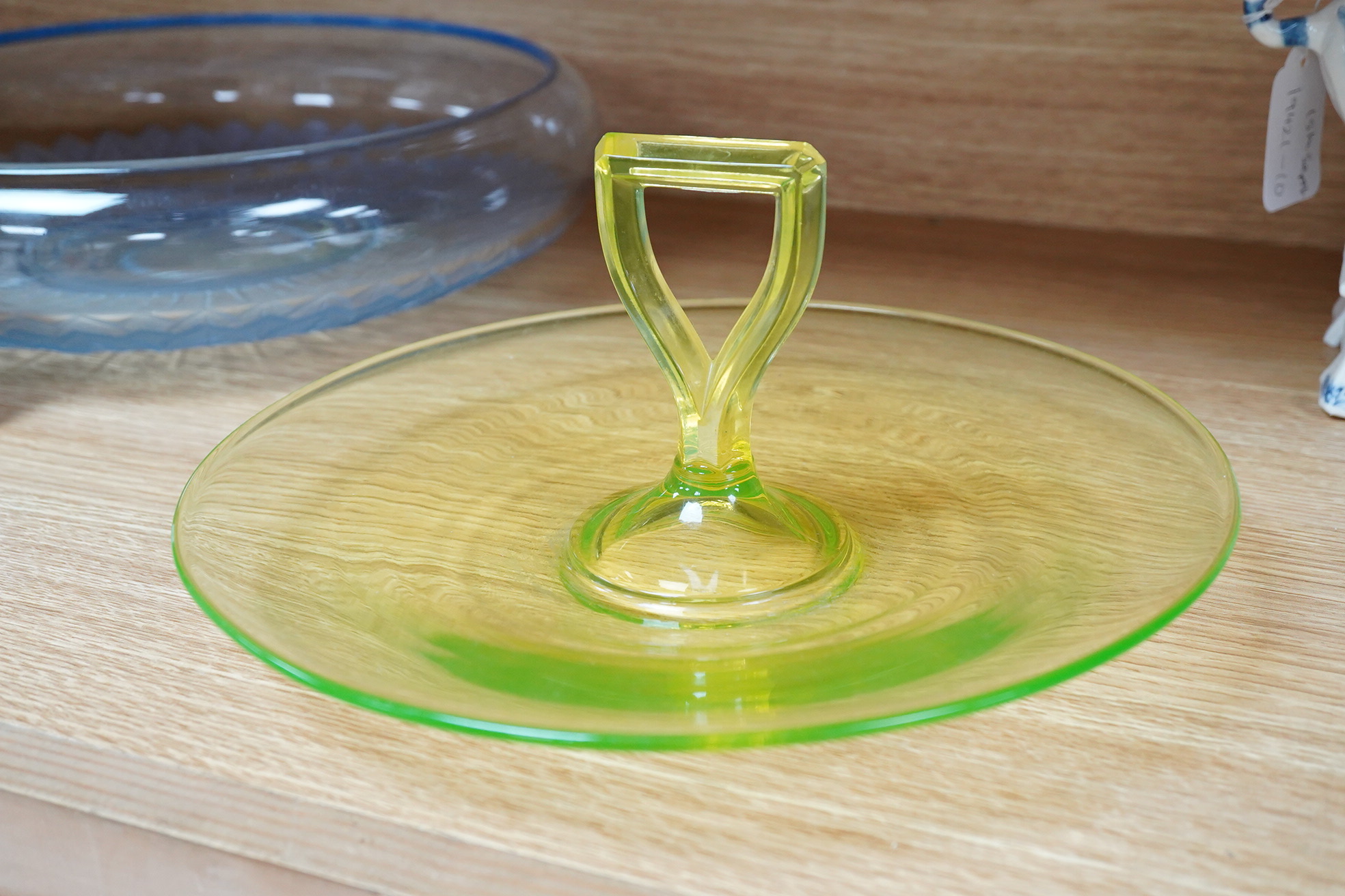 A Muller Art Deco glass dish, together with a uranium glass cake stand, largest 32cm in diameter